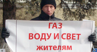 Участник пикета жителей Кубани в г. Темрюке Краснодарского края. 26 февраля 2011 г. Фото "Кавказского узла".