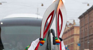 Олимпийский огонь на эстафете. Фото: http://sc-os.ru Олимпийский огонь на эстафете. Фото: http://sc-os.ru