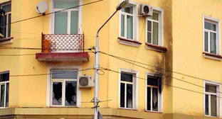Возгорание в квартире, где расположен офис Сводной мобильной группы (СМГ). Грозный, 15 декабря 2014 г. Фото Ахмеда Альдебирова для "Кавказского узла"