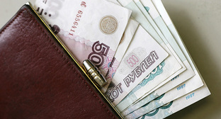 Деньги в кошельке. Фото: cityreporter.ru