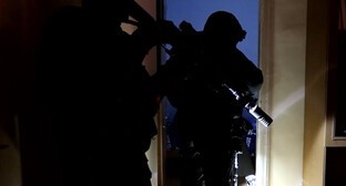 Сотрудники спецслужб. Скриншот видео РБК https://www.rbc.ru/rbcfreenews/6581445a9a7947c7252e7aa5