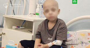 Эвакуированный из Китая мальчик. Фото: Telegram-канал "НТВ" Эвакуированный из Китая мальчик. Фото: Telegram-канал "НТВ"