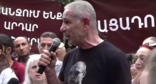 Исраэл Акопкохян у здания ЦИК Армении. Стоп-кадр видео News.Am от 14.06.26, https://www.youtube.com/watch?v=gHKjTA08qww&t=8s